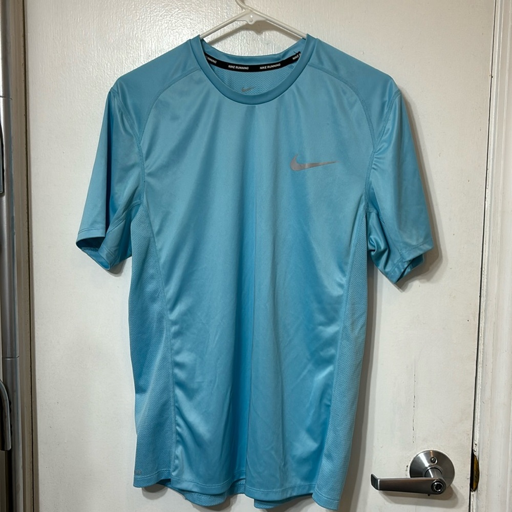 Blue Nike running shirt